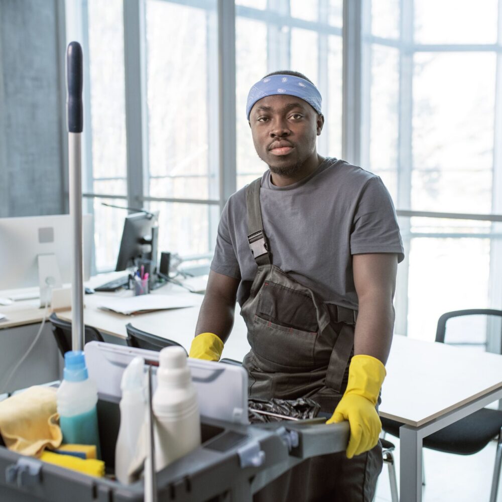 medium-shot-man-with-cleaning-cart